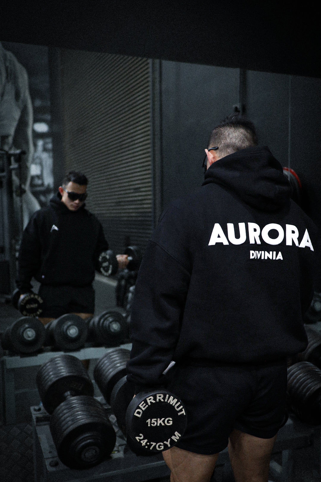 Aurora Divinia Divine Black Hoodie — oversized black hoodie with white Aurora Divinia logo on chest, Act 1.0 collection